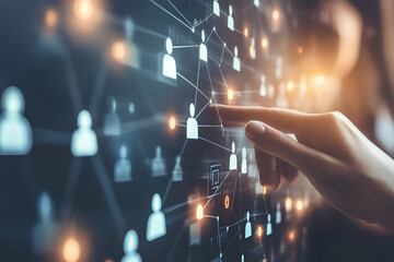 A hand points to a glowing network of interconnected icons on a dark background, representing digital connection and global communication.