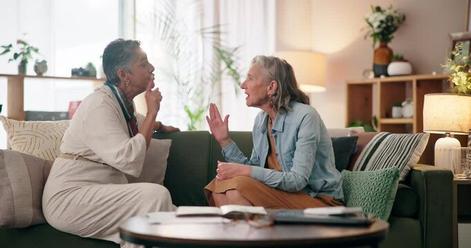 Mature lesbian couple, argument and fight with communication, angry and drama in conversation as partner. Women, unhappy and annoyed with frustrated, speaking and discussion in home as married people