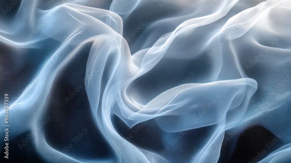 Poster A blue and white fabric with a pattern of lines and swirls. The fabric appears to be made of a synthetic material and has a shiny, almost metallic appearance. Concept of movement and fluidity