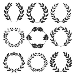 Obraz premium A collection of nine black and white laurel wreath designs on a white background.