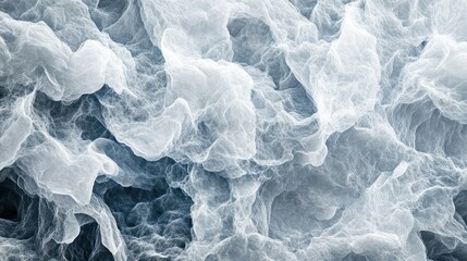 Fototapeta premium The image is a blurry, white and blue wave. The wave is very large and has a lot of detail, including small ripples and crests