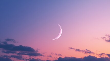 A peaceful evening sky with a glowing crescent moon, ample copy space surrounding the soft gradient of the twilight sky.