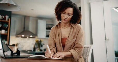 Remote work, laptop and woman writing notes for schedule, appointment booking or agenda with virtual assistant. African freelancer, notebook and typing online for research or planning in home office