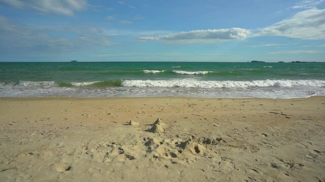 seascape landscape background by sea sand beach or island with slow motion little waves and nature blue sky daylight for summer holiday travel to nobody at rayong in thailand and video shot CPL filter