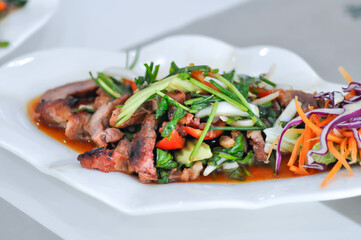 grilled pork salad, spicy pork salad or stir fried pork with vegetable