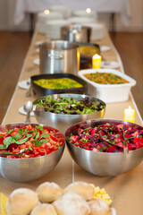 View of a section of a food buffet table at a wedding reception