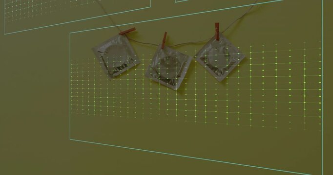Animation of cardiograph over condoms on yellow background