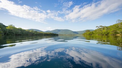 Smooth and pristine water surface, reflecting a crystal-clear, pure background