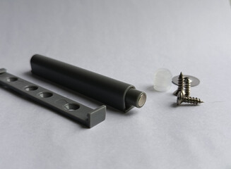The pusher is the opening mechanism for the door of the chiffonier. Mechanism for automatic opening...