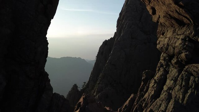 Trou de la Bombe, Massiv dde Bavella, Corse, France at sunrise, view from drone