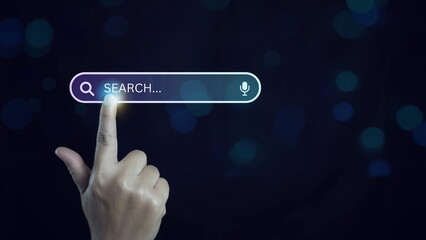 Businessman touching to search engine bar business planing in new year concept.of marketing survey concept