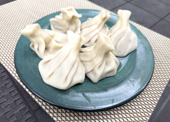 Khinkali in a plate on the table