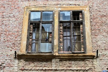 old broken windows on the house