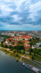 Fototapeta premium aerial view of krakow center and wawel royal castle at sunset in summer in poland