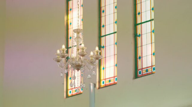 Chandeliers and staned glass windows in an Asian church