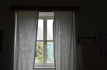 Fototapeta premium window with old white curtains
