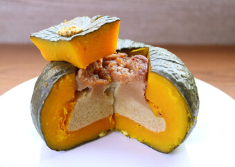Mouthwatering Homemade Coconut Milk Cinnamon Custard in Steamed Whole Pumpkin Fruit