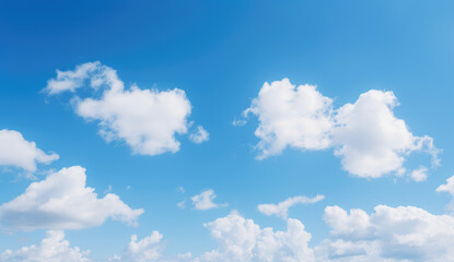 Fototapeta premium Serene Sky: Fluffy Clouds on Blue Canvas