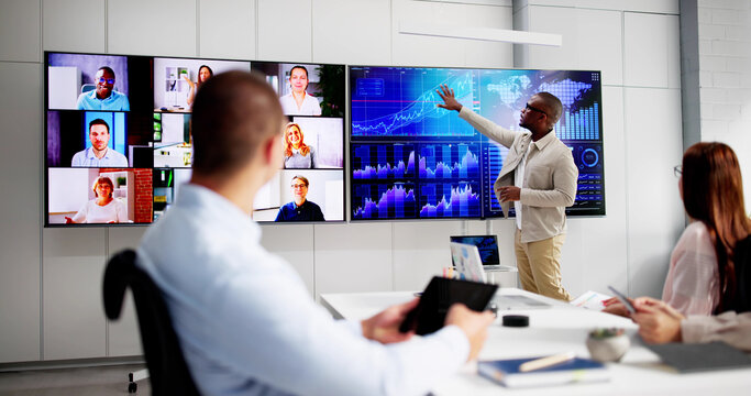 Business Presentation In Meeting Room. People Looking