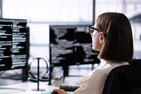 Software Engineer Developer Using Desktop Computer - Powered by Adobe