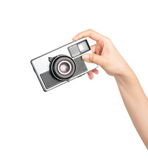 Hand holding vintage camera on isolated white background.