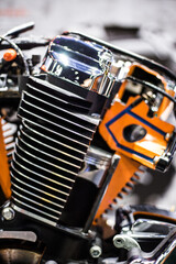 Shiny chrome motorcycle engine with twin piston