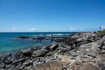 Ho'okipa Beach Park in Maui Hawaii, renowned windsurfing and surf site for wind, big waves and big Turtles drying on sand. Snorkeling paradise for coral reefs.