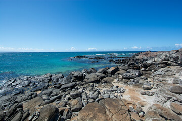 Ho'okipa Beach Park in Maui Hawaii, renowned windsurfing and surf site for wind, big waves and big Turtles drying on sand. Snorkeling paradise for coral reefs.