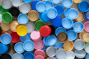 close up plastic bottles caps for recycling to conserve the environment, recycling, reuse, garbage disposal, save the world concpet