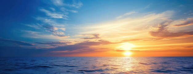 Obraz premium Serene Ocean Sunset Panorama with Vibrant Sky