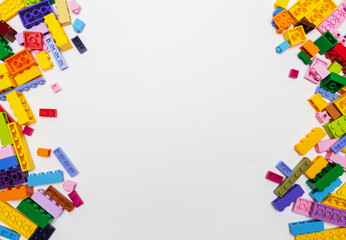 Colorful Plastic toy blocks isolated on white background.