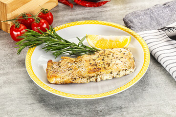 Baked salmon fish served rosemary