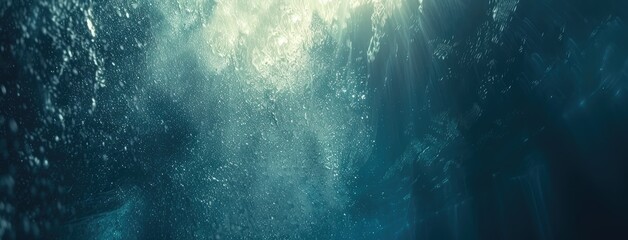 Obraz premium Sunlight Shining Through Deep Blue Ocean