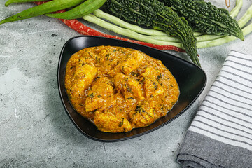 Spicy chicken masala in the bowl