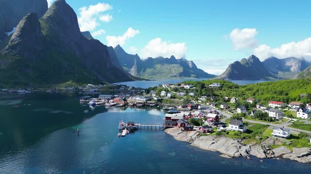 Aerial revolving shot of Reine in Lofoten Islands, Norway at summer