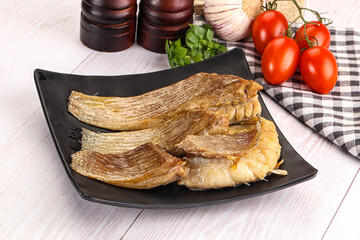 Baked stingray witngs with oil