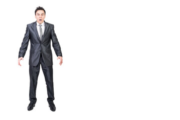 Astonished young businessman with opened mouth. White background.