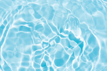 Blue water with ripples on the surface. Defocus blurred transparent blue colored clear calm water...