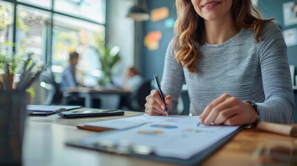 HR manager conducting a job interview, sitting across a desk, clipboard in hand, formal office, natural indoor light, soft shadows.