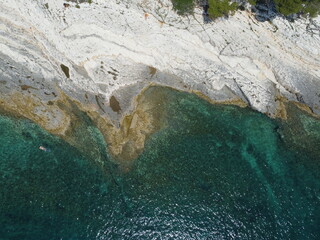 Rocky and Green Sea Color from above, drone footage in Croatia