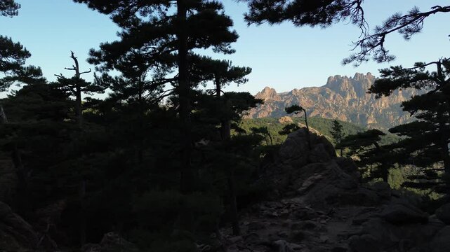 Trou de la Bombe, Massiv dde Bavella, Corse, France at sunrise, view from drone