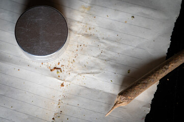 Legalization cannabis reform 420. Joint with dried cannabis leaves paper and metal marijuana...
