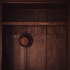 Vintage wooden wardrobe. A closed up shot of antique wardrobe cabinet with selective focus on...