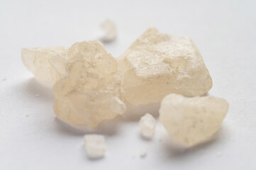 World Drug Day. World AIDS Day. crystal mephedrone designer drugs, bath salt on white background.