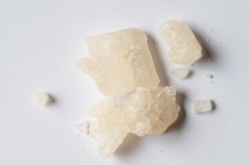 World Drug Day. World AIDS Day. crystal mephedrone designer drugs, bath salt on white background.