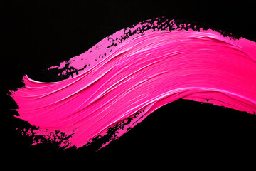 bright pink brush stroke paint on black background