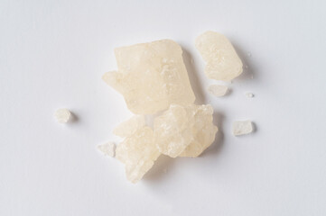 World Drug Day. World AIDS Day. crystal mephedrone designer drugs, bath salt on white background.