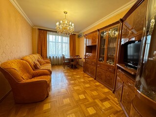 Classic Living Room with Vintage Furniture and Elegant Chandelier