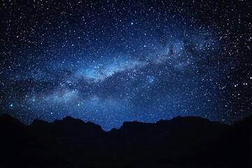 A Majestic Night Sky: Stars and Mountains Under a Dark Canvas