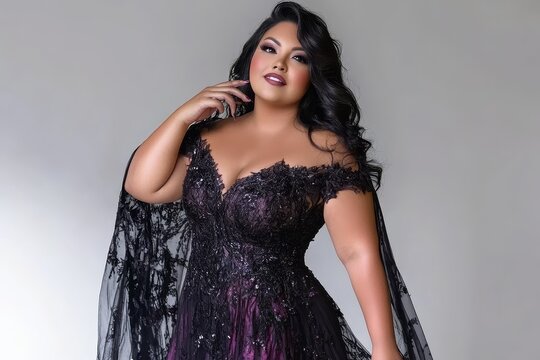 Glamorous plus size model in an elegant evening gown.